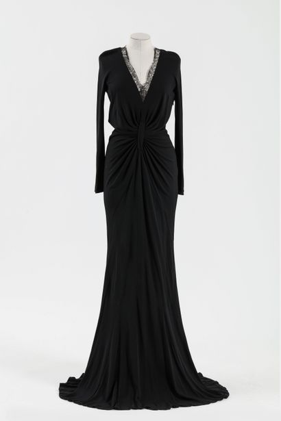 null Christian DIOR: long evening dress in black jersey, neckline trimmed with black...