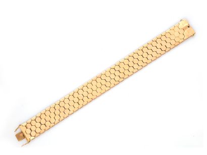 null 43 18K (750 ) yellow gold cuff bracelet with honeycomb mesh on five rows, ratchet...