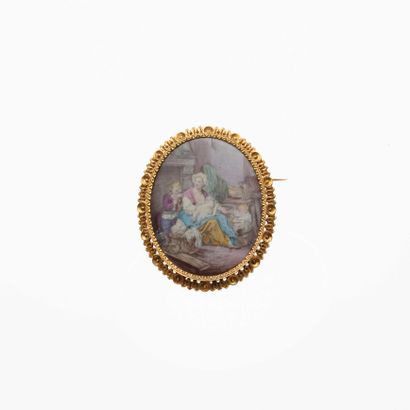 null 16 18K (750) yellow gold brooch presenting an oval polychrome miniature painted...