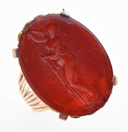 null Ring in yellow gold 9K 385 thousandths decorated with a plate of oval carnelian...