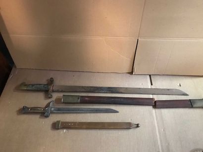 null Saber and its scabbard and a bayonet