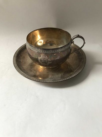 null Silver cup and saucer decorated with a frieze of palmettes, numbered CG or CS...