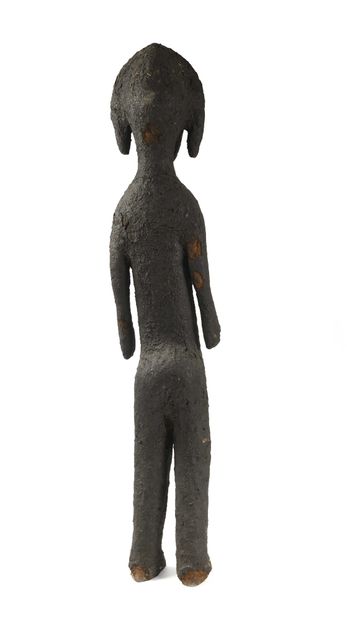 null 
MALI, Bambara. Large fetish sculpture representing a woman covered with an...