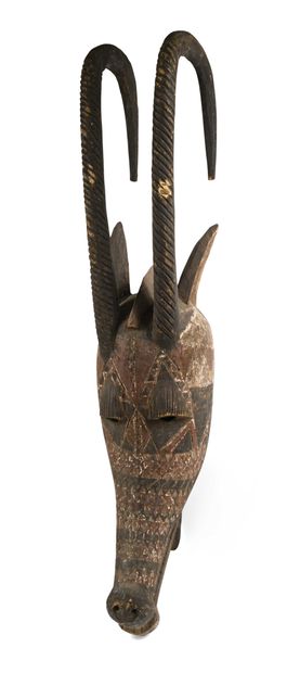 null BURKINA FASSO, Mossi. Helmet mask representing an antelope with long horns curved...