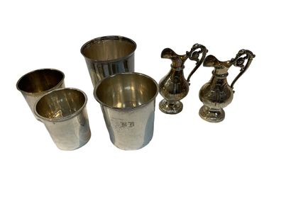 null Silver lot including two small ewers (gross weight: 146g), a plain silver kettle...