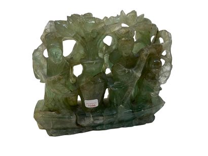null Green hard stone sculpture with characters on a boat. Work of the Far East.
H...