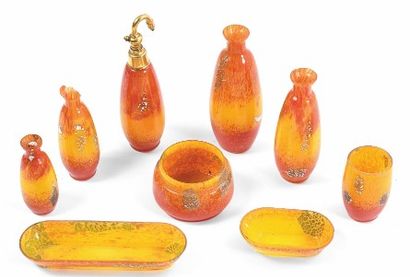 null Garniture of toilet in yellow and orange tinted glass. Including two empty pockets,...