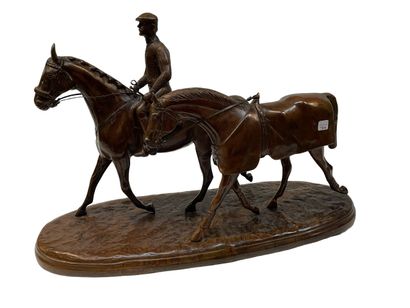 null Sculpture en bronze doré à patine brune.
Les chevaux et le cavalier.
36 x 59...
