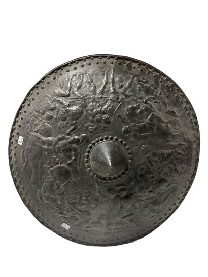 null Shield in cast iron decorated with warlike scenes.
Diameter : 54 cm
XIXth c...