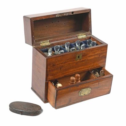 null Traveling pharmacy. Mahogany case, brass handles, complete with its bottles,...