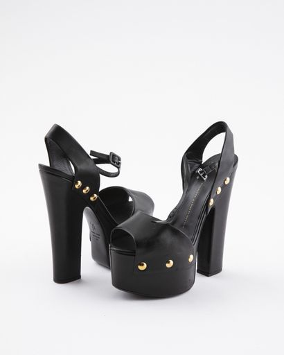 null GIUSEPPE ZANOTTI design: Platform sandals in black leather with gold metal studs,...