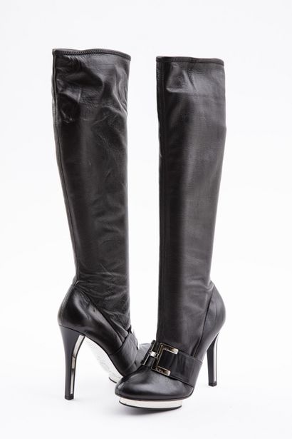 null VERSACE: Black leather boots decorated with a silver metal buckle on the vamp,...