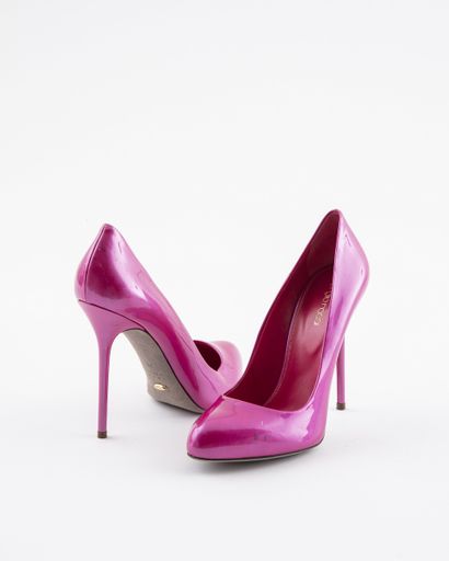 null SERGIO ROSSI: Two pairs of fuchsia pink and plum patent leather pumps. T. 39....