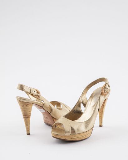null JIMMY CHOO - SERGIO ROSSI : Lot including a Pair of patent leather beige pumps...