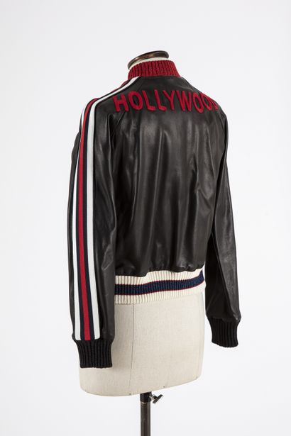 null GUCCI: Very nice black leather jacket with red lurex on the collar, and white...