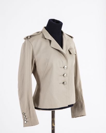 null LOUIS VUITTON Paris: Small beige cotton jacket, notched collar, flap pocket...