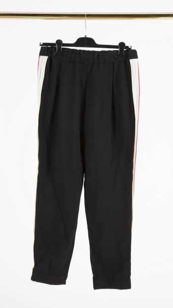 null FENDI: Black acetate sport swear pants, decorated with bands of creamy yellow...
