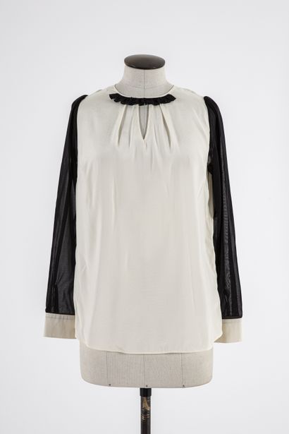 null XANDRES: Lot including a blouse in silk, black and ivory spandex, round neck...