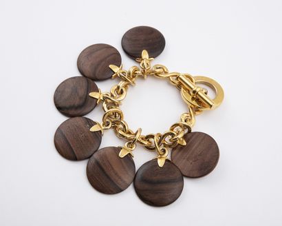 CELINE : Bracelet chaine en métal doré brossé...