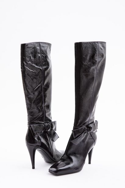 null SERGIO ROSSI: Black patent leather boots with purple stitching, decorated with...
