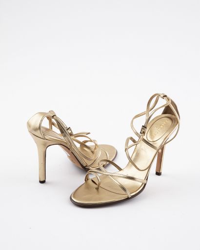 null SERGIO ROSSI: Gold leather sandals closed with a strap at the back. S. 38 H....