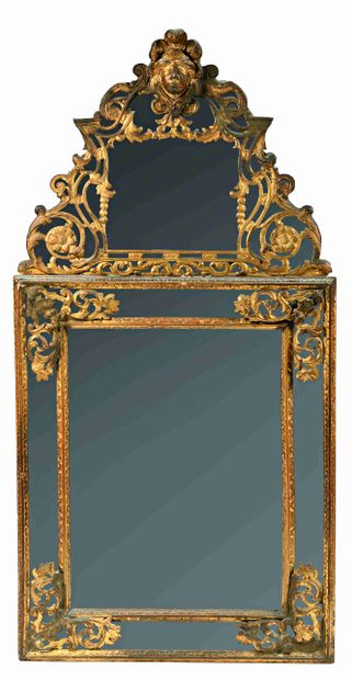 Important gilded wood mirror with foliage...