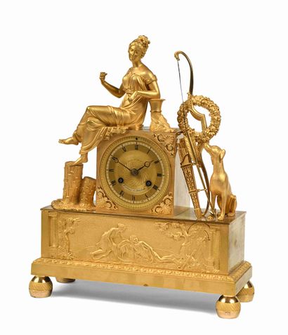 null Clock with Diana the Huntress in chased and gilded bronze representing the goddess...