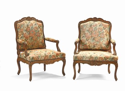 Pair of flat-backed armchairs in oak carved...