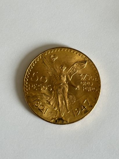 null 37 A 50 pesos Mexican gold coin from 1947.