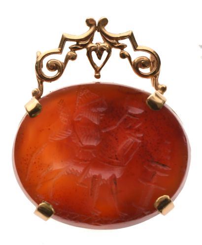 null 96 18K (750) gold pendant set with a carnelian intaglio representing a rider,...