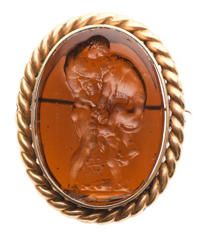 null 88 Gold brooch set with an intaglio engraved on glass representing Heracles...
