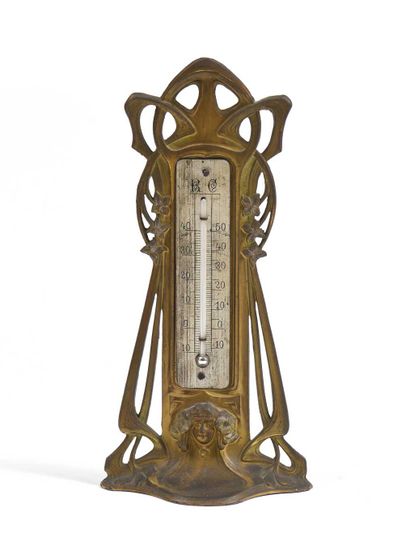 null FRENCH WORK 1900 Small gilded metal thermometer with a woman's face in the lower...