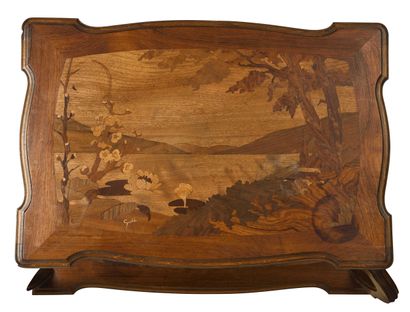 null GUTH Paul (1910-1937) Moulded walnut double-top table with inlaid lakescape...