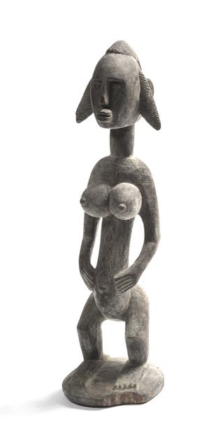 null MUMUYE statue in carved wood. Height: 55 cm (Traces of humidity)