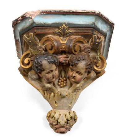 null Polychrome and gold plaster sconce console, decorated with putti, leathers and...