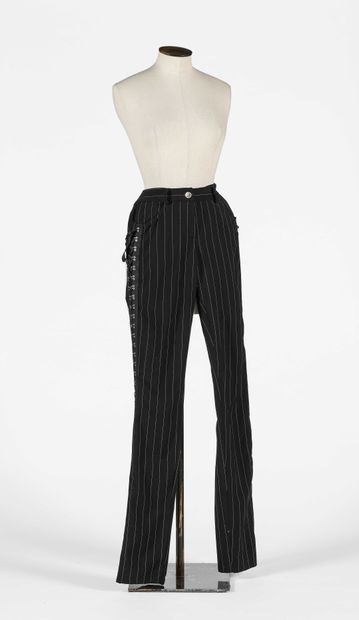 null JOHN GALLIANO: Black and white striped straight-leg pants in assumed cotton....
