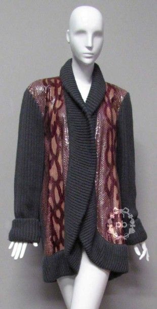 null GIVENCHY Nouvelle Boutique, circa 1980

VESTE 7/8 en tricot de laine côtelé...