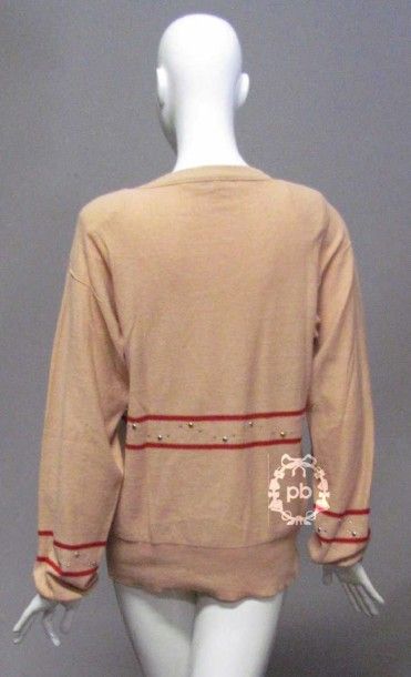 null Sonia RYKIEL (automne-hiver 1985/86)

ENSEMBLE en laine chair et rouge orné...