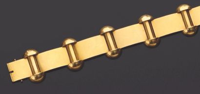 null Bracelet articulé en or jaune (750) à maillons unis alternés de motifs géométriques....