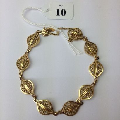 null Bracelet souple en or jaune (750) à mailles ovales fili­granées. Poids: 19 ...