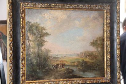 Ecole du XIXème siècle 

Paysage lacustre avec des vaches

Huile sur toile

Porte...