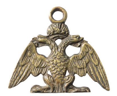 null Élément d’équipement militaire en bronze ciselé à décor de l’aigle impériale...
