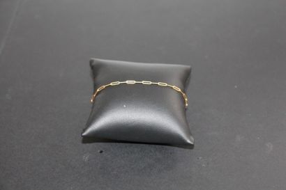 null Fine chaîne bracelet en or jaune (750) à mailles oblongues. Poids 1.5g