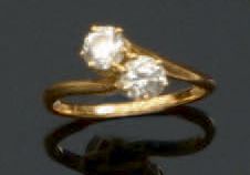 null Bague Toi & Moi en or jaune (18K, 750‰) sertie de deux diamants de taille brillant.
Poids...