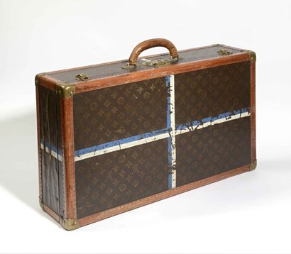 null Louis Vuitton valise 
Toile Monogram  ( accidents ) rehaussé d'une ligne blanche...