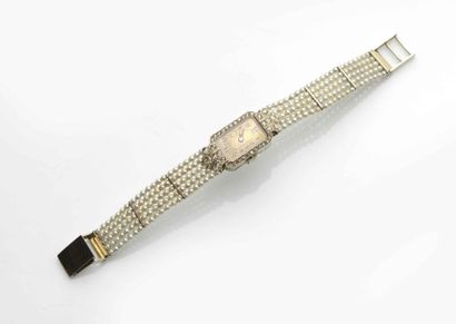 null Montre bracelet de dame en or gris 18ct (750), le boîtier rectangulaire cerné...