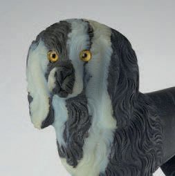 null FABERGÉ
Rare figurine représentant un coq en agate zonée finement sculptée de...