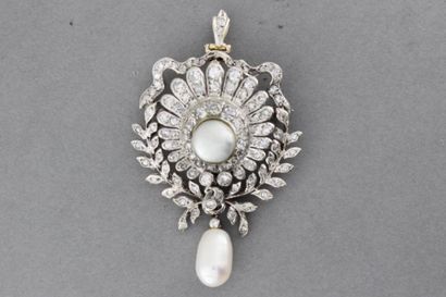 null Broche pendentif en or (750 millièmes) sertie de brillants retenant une perle...