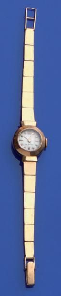 null Montre-bracelet de dame en or jaune (750/1000e), boîtier rond.
Poids brut: 13,8...