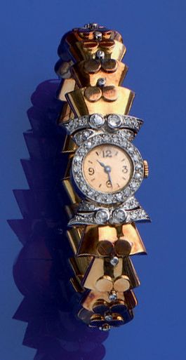 null Montre-bracelet de dame mécanique en or jaune et or gris 18K (750) à boîtier...